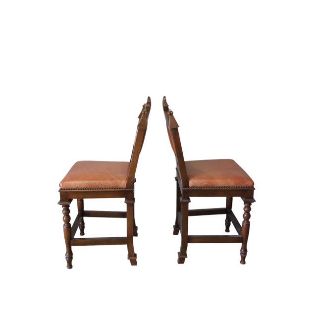 Set of 4 solid wood Gothic-style counter height stools from the Paul Ferrante showroom in Los Angeles. From a California...
