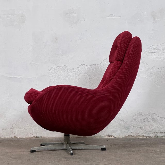 This iconic czechoslovakian swivel chair was produced by the renowned manufacturer up závody during the 1960s. A...