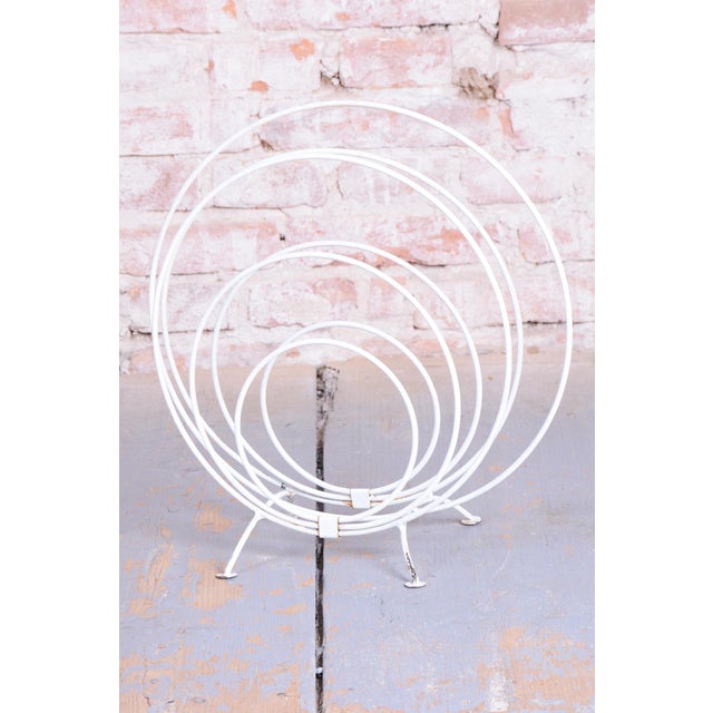 This distinctive and playful magazine rack from the 1960s, originating from Czechoslovakia, embodies the unmistakable...