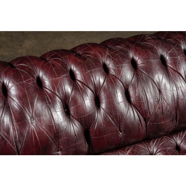 Animal Skin Mid 20th Century Deep Oxblood Leather Chesterfield Sofa With Nailhead Trim For Sale - Image 7 of 12