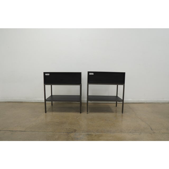 Inspired by clean mid-century design, a stylish nightstand of solid black-washed poplar brings extra space to bedside...