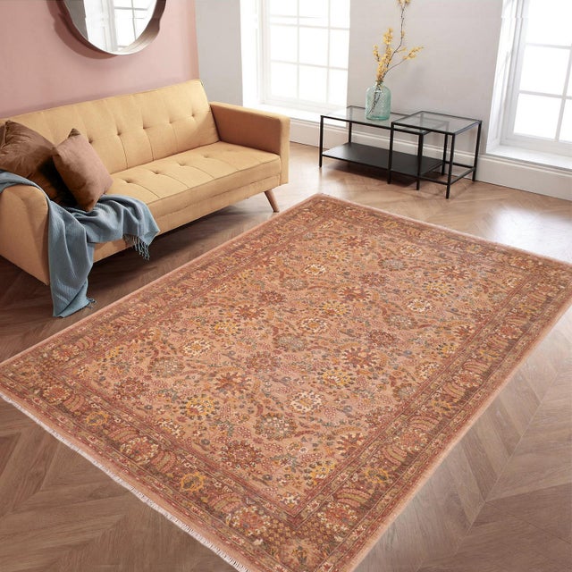 "Enhance the ambiance of your home with this magnificent Persian-influenced Turkish hand-knotted rug made by skilled...