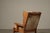 Distinctive Brutalist lounge chair with matching ottoman, crafted in solid oak and upholstered in its original natural...
