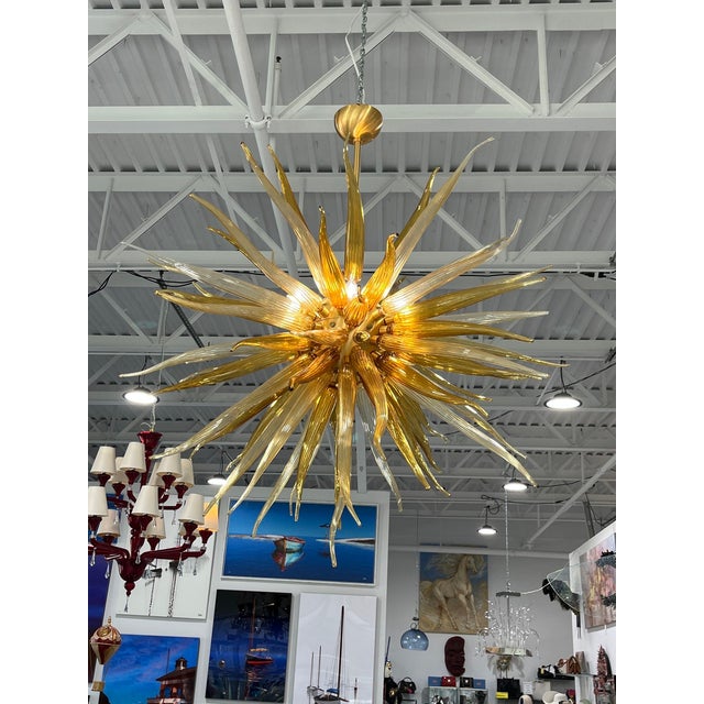 This incredible Sol chandelier was created by well-known Glass Master Simone Cenedese, one of Murano's top artisans. The...