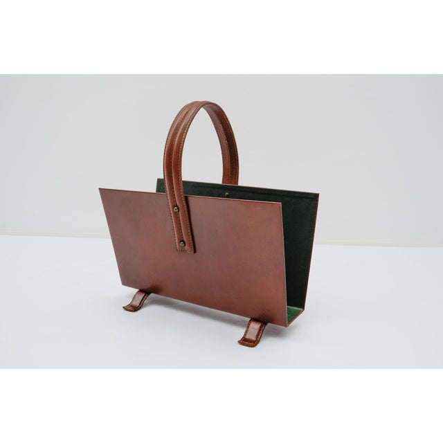 Magazine Rack in Leather and Brass from Jacques Adnet, 1950s, in Very Good conditions. Designed 1960 to 1969