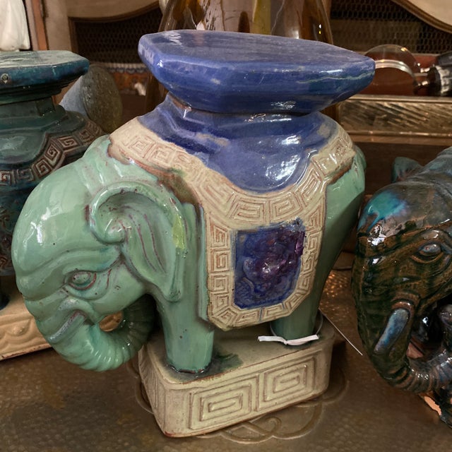 Gorgeous set of three Midcentury terracotta glazed finish elephant plant stands or decorative garden figurines.
