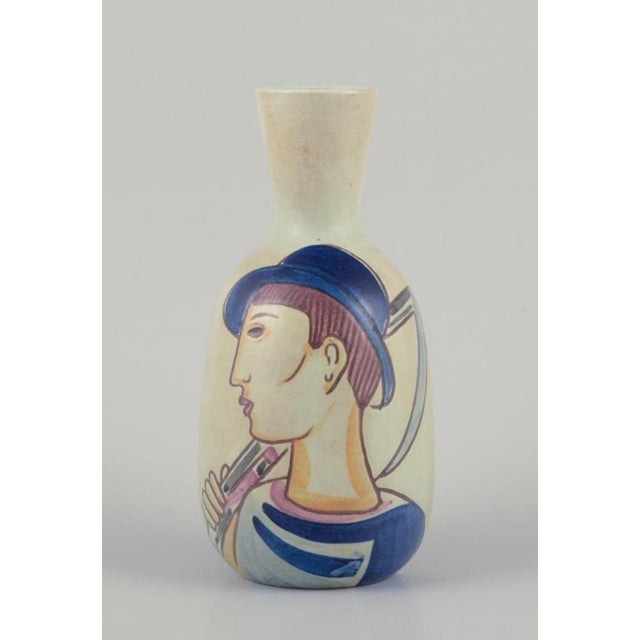 Carl Harry Stålhane (1920-1990) for Rörstrand. "Folkvisan" ceramic vase with motif of a young farming couple. Hand-...