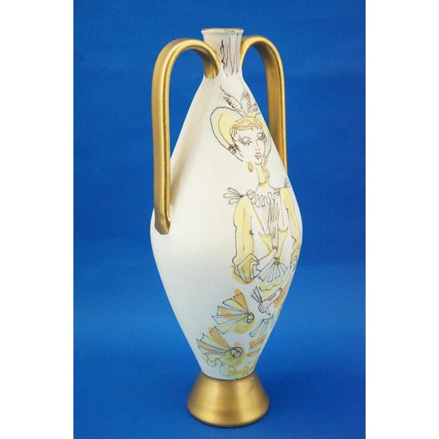 Item : a graceful two-handled, ellipsoidal vase made of cast ceramic, also known as soft porcelain, meaning ceramic with...