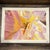 A beautiful original oil pastel floral artwork featuring an intimate, close-up view of a blooming flower in a luminous...