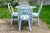 A bamboo rattan patio dining set featuring a 36" round glass-top table and four matching chairs. Beautifully refinished in...