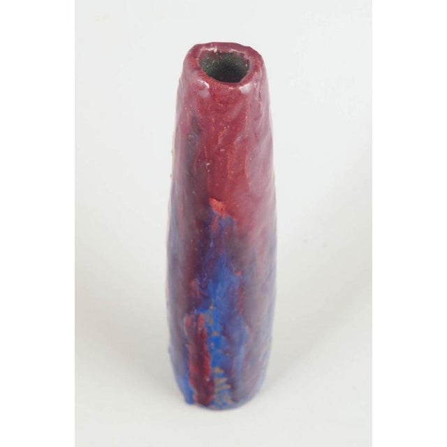 European studio ceramicist Unique vase, 1964. Tall and slender vase in stoneware with a lively, layered glaze in red and...