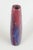 European studio ceramicist Unique vase, 1964. Tall and slender vase in stoneware with a lively, layered glaze in red and...