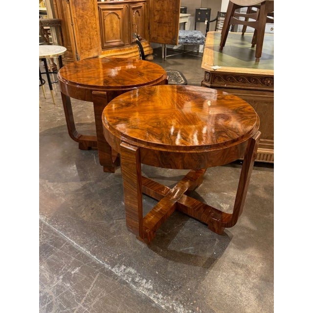 This product is a pair of vintage/retro style walnut side tables that showcase the popular Art Deco design. Made from rich...