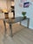 Smoked glass, stainless steel dining table designed by Italian designer Gianfranco Frattini in the '70s, reproduced by CB2...