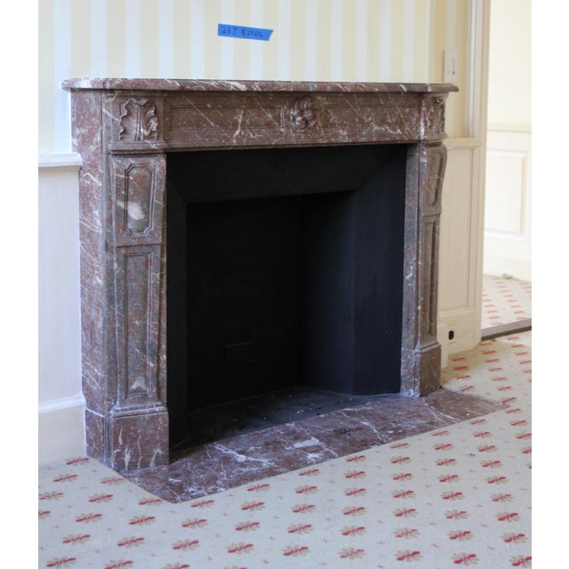 This mantel was salvaged from the Waldorf Astoria Hotel and is carved from Rouge Royale - a rich oxblood marble...