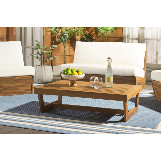 Introducing our Lynn Coffee Table Outdoor where style meets sustainability in the spirit of outdoor living. Expertly...