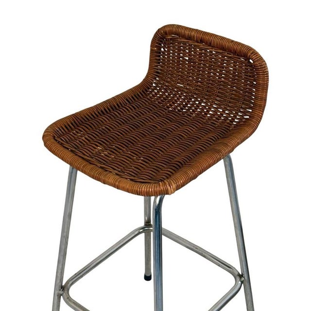 Design by Dirk van Sliedrecht and made by Rohe Noordwolde. Chromed, tubular frame and wicker / rattan seat. In great...