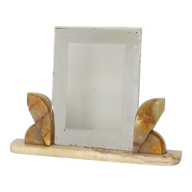 Art Deco photo frame with a geometric design, crafted from onyx marble and glass with a mirrored border; dating from the...