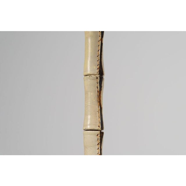 This exceptional table lamp is a masterpiece of modernist design by the renowned french designer jacques adnet, crafted in...