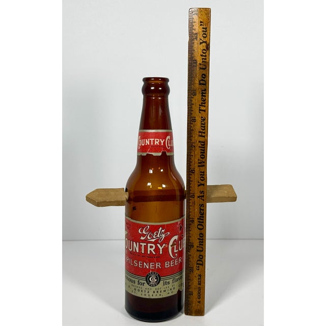 Orange Folk Art Arrow Through Goetz Beer Bottle: Whimsical Display Piece For Sale - Image 8 of 10
