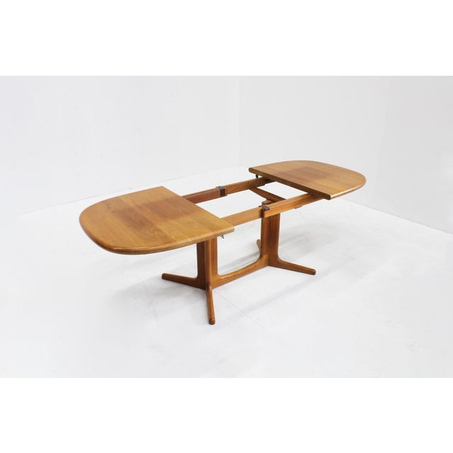 Glostrup Danish oval extendable dining table made of solid teak wood from the 1960s by the Danish brand Glostrup. Thanks...
