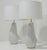 Illuminate your space with the Pair of Contour Artic White Ceramic Table Lamps designed by Kelly Wearstler, a masterpiece...