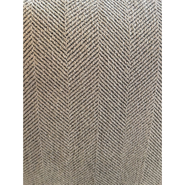 Lounge chair with a dorset arm and a stylish skirt. This piece blends traditional elements with a modern twist, adding to...