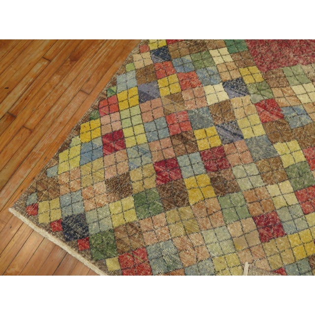 Colorful vintage one of a kind wide Turkish Deco gallery runner with a colorful diamond motif with a red center medallion....