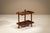 Some objects express their quality through quiet confidence. This elegant serving trolley, designed by franco albini and...