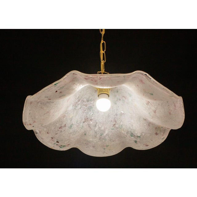 Delightful vintage Murano chandelier made of blown bead glass with a multicolor millefiori glass. The glass is in the...