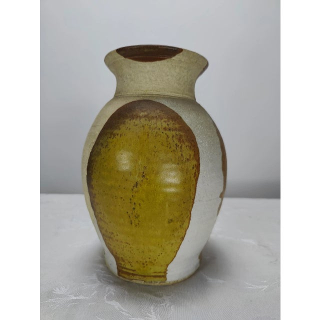 Overall very good condition. Measures approximately 9 inches tall by 6.5 at widest point. Features a glazed portion to the...