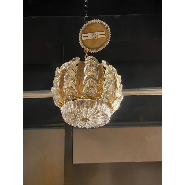 A circa 1930's Austrian crystal and brass light fixture with 4 lights