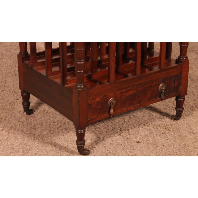 A superb early 19th-century Regency mahogany Canterbury or magazine rack. It features four solid mahogany compartments,...