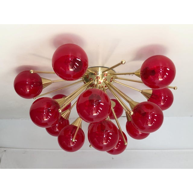 Italian sputnik flush mount with rose pink Murano glass globes carefully hand blown with bubbles inside the glass using...