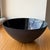 Vintage mid-century modern Krenit bowl designed by Herbert Krenchel. Enamel coated steel 6.5" diameter, 3" height. The...