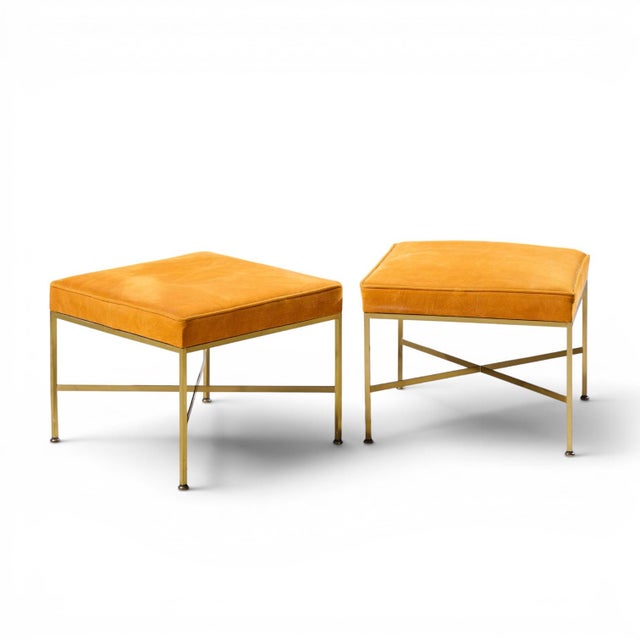 Paul McCobb for Calvin Mid Century Brass X Base Stools - Pair Each stool measures: 20.5 wide x 20.5 deep x 16 high, with a...