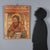 Fake fresco tear. Emulating an ancient fresco, the face of Saint Anthony the Abbot is depicted here, recognizable by...