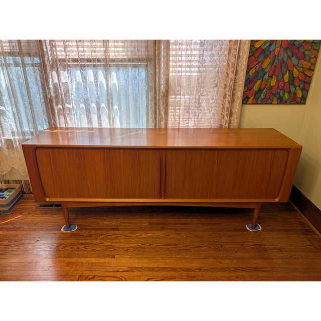 This is a monumental piece of Danish teak furniture. The legs date it to be from the late '60s, made by famous Danish...