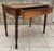 Beautiful late 19th to early 20th century provincial farmhouse table crafted in solid walnut with a warm, naturally aged...