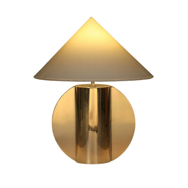 The Geo Table Lamp blends modern polish with understated elegance. Its sleek chrome-finished metal base catches the light...