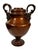 A spectacular and commanding bronze urn, richly embellished with Renaissance-inspired classical detailing. From sculpted...