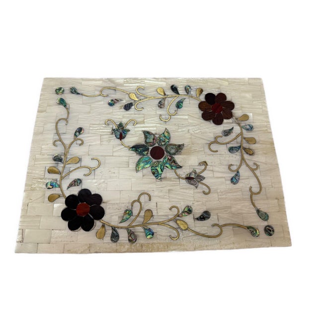 Handmade Mother of Pearl Jewelry Box with Floral Inlay Celebrate timeless craftsmanship with this elegant handmade jewelry...