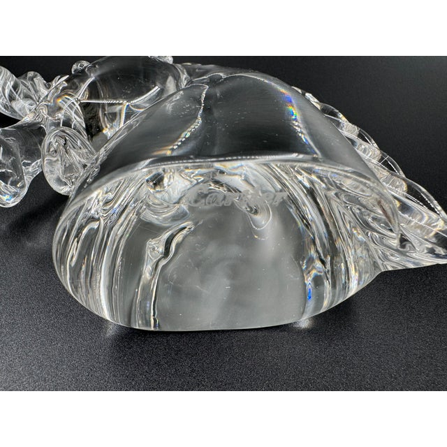 This Cartier crystal unicorn sculpture, crafted in collaboration with Daum France in the 1980s, is a stunning example of...