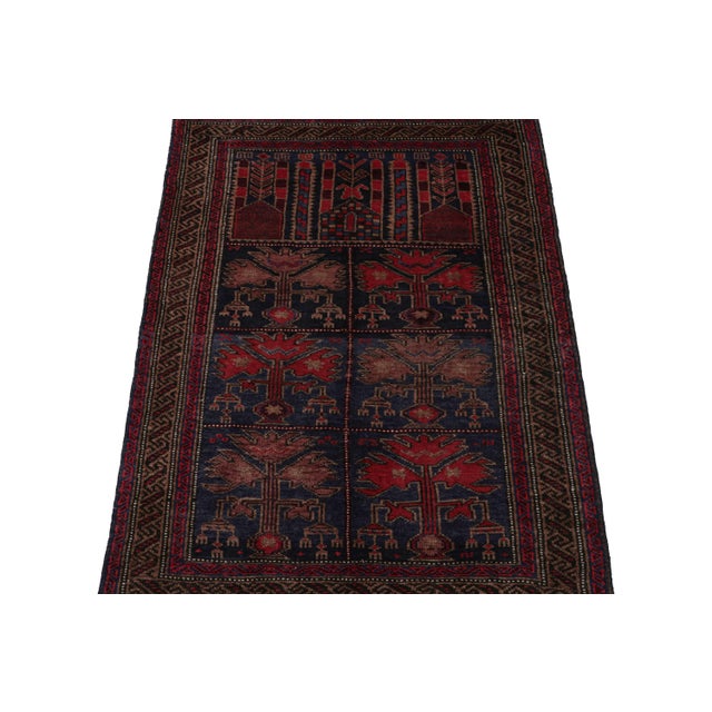 Hand knotted in wool, this 6x8 Baluch rug represents a new line of tribal carpets in the Modern Classics Collection by Rug...