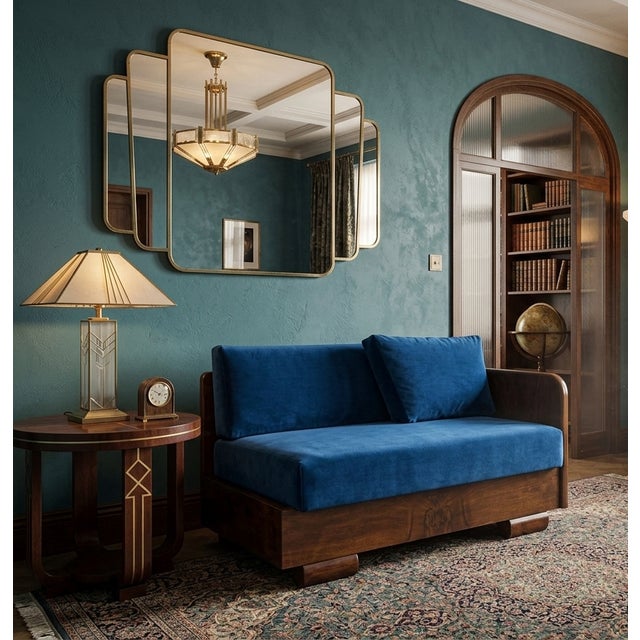 A stunning, professionally restored Art Deco sofa sourced from Austria, showcasing the clean, architectural lines...