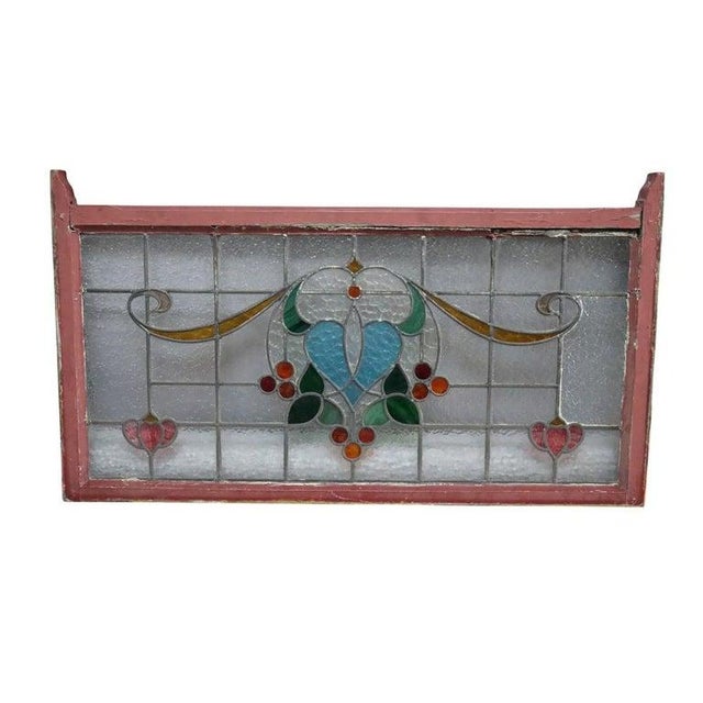 This is a pair of antique leaded stained glass windows, in the manner of the Arts & Crafts icon, Frank Lloyd Wright,...