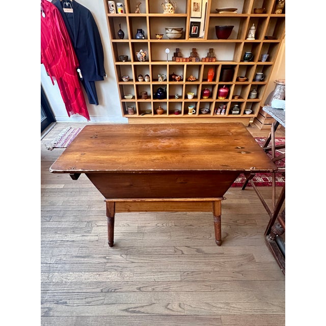 Solid wood 19th century antique dough box with removable top and storage underneath. Antique aged patina in a warm wood...