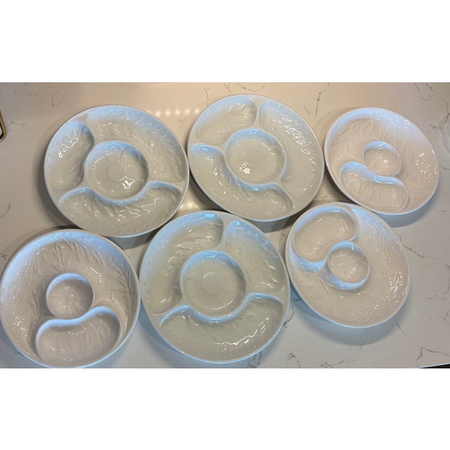 Mixed set of 6 white porcelain artichoke plates: 3 Apilco (9.25” round) sourced from Lyons, France; and 3 Bordallo...