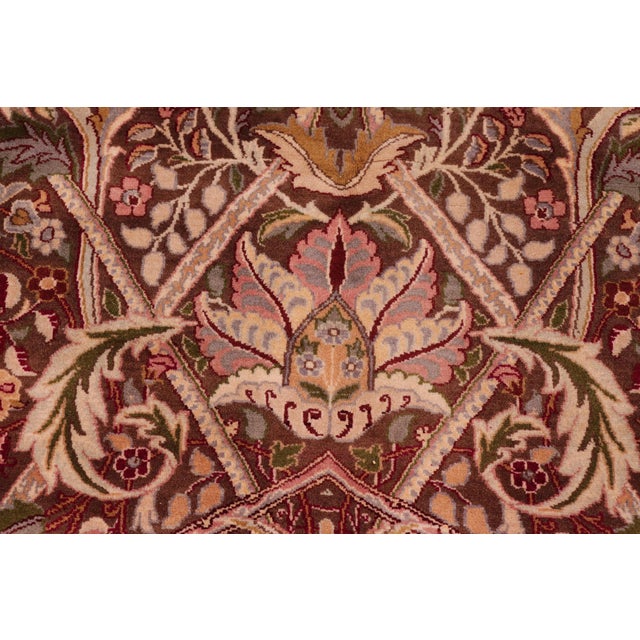 Designed with mesmerizing intricacy and gorgeous color palette, this hand-knotted masterpiece demonstrates the beauty and...