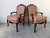 Bring timeless French elegance to your home with this beautiful pair of vintage Louis XV style armchairs. Featuring finely...